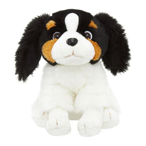 Veľký plyšový pes v ležiacej polohe