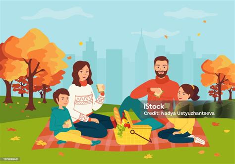 Rodina hrajúca sa s argentínskou dogou v parku