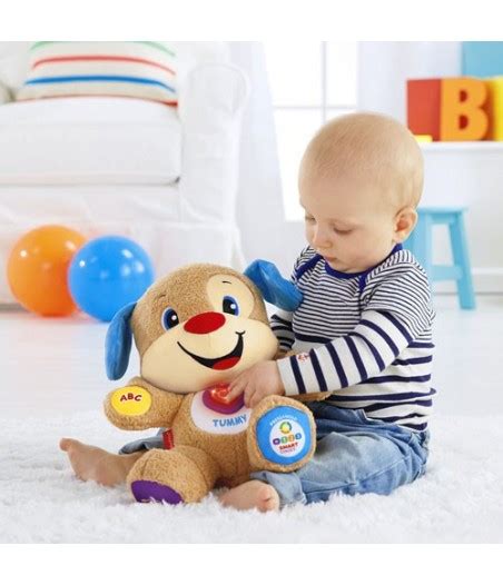 Dieťa hrá s hovoriacim psíkom Fisher-Price