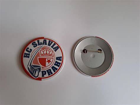 Staré logo s párkou v rožku a jazvečíkom